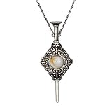 Noble Collection - Réplique Harry Potter Les Animaux Fantastiques 2 - Pendentif Gellert Grindelwald 7cm - 0849421005085