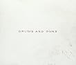 DRUMS AND GUNS