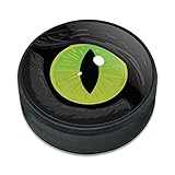 アイスホッケーパック猫の緑の目