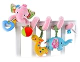 赤ちゃんのベッドは、ぬいぐるみのあたりのピンクの象のペンダント