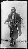 1909 Photo Quanah Parker, Comanche Indian Chief, full-length portrait, standing, facing front, holdi