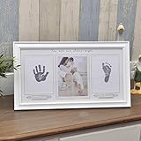 新生児の手と足の印刷泥の赤ちゃんの手と足の印刷泥の赤ちゃん百日満月の手形のフォトフレームのセットアップ