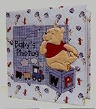 Baby's First Photo Album Featuring Disney's Winnie the Pooh by A.D. Sutton & Sons, Inc.