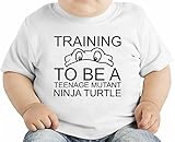 Training To Be A Teenage Mutant Ninja Turtle Slogan オーガニックベビーTシャツ 12 - 18 Months
