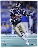 NFLラムズマーシャル・フォークRushingヘッドonブルージャージー垂直写真