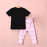 小さい女の子の短い上着の子供白いTシャツに黒い目、唇がズボンにかわいいピンクの幾何学衣装スタイルよく売れる