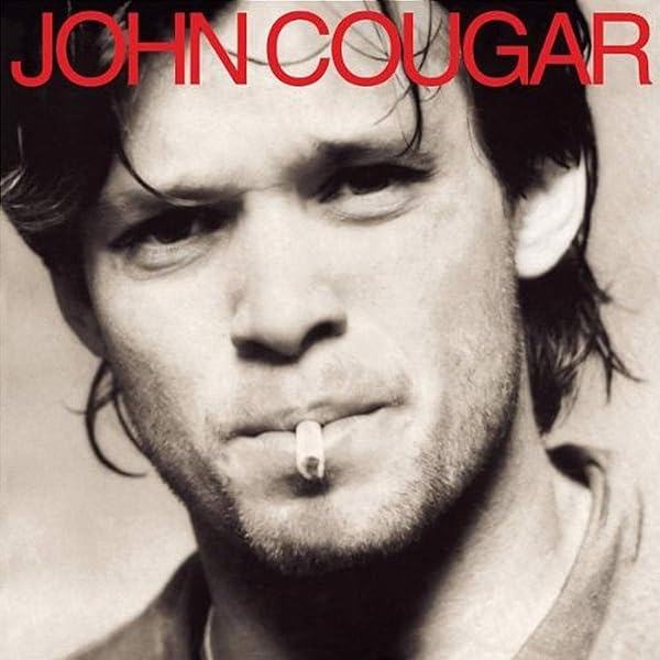 Amazon.co.jp: Johnny Cougar: A Biography: ミュージック
