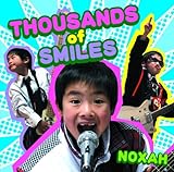 THOUSANDS of SMILES�`�Ί�̂�����`