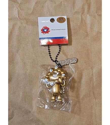 Amazon.co.jp: ミャクミャク 立体キーホルダー プレート ゴールド