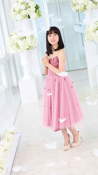 アプリゲームとコラボしたことのあるアニメや芸能人 - ピンクのドレスを着た環奈さん。